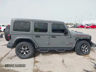 2020 Jeep Wrangler Unlimited Rubicon z VIN 1C4HJXFG2LW267154, wystawiony jako IAAI lot #41745497 z przebiegiem 28 692 mil mil oraz . Historia ofert i sprzedaży dostępna na DreamBid. Obrazek 14.