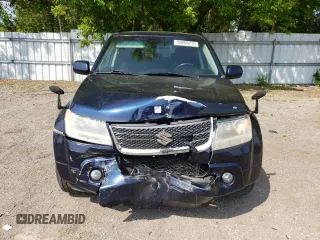 2010 Suzuki Grand Vitara z VIN JS3TD0D46A4100422, wystawiony jako Copart lot #59288715 z przebiegiem 214 865 mil mil oraz Czysty tytuł • Clean title. Historia ofert i sprzedaży dostępna na DreamBid. Obrazek 5.
