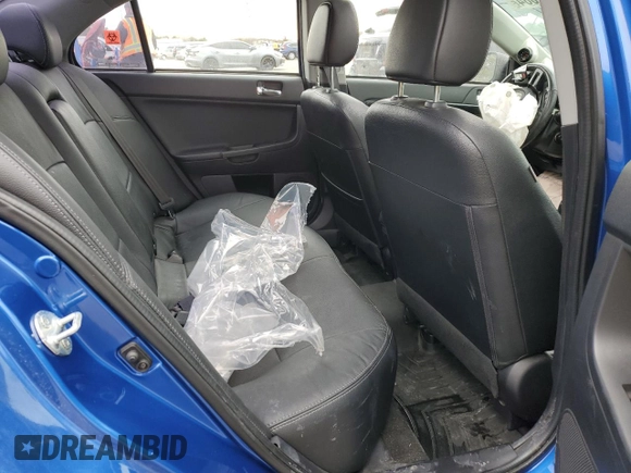 2015 Mitsubishi Lancer Evolution GSR z VIN JA32W8FV7FU023106, wystawiony jako Copart lot #40867084 z przebiegiem 103 964 mil mil oraz Szkoda całkowita • Salvage title. Historia ofert i sprzedaży dostępna na DreamBid. Obrazek 10.