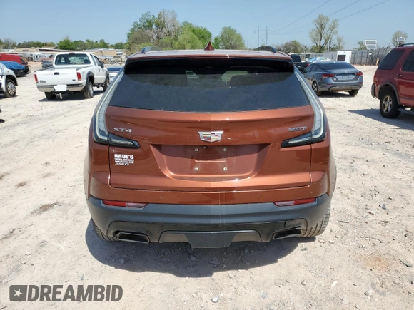 2019 Cadillac XT4 AWD Sport with VIN 1GYFZFR42KF136567, listed as a Copart auction lot 52018445 with 99,944 mi miles and Salvage title. Bid and sale history available at DreamBid. Image 6.