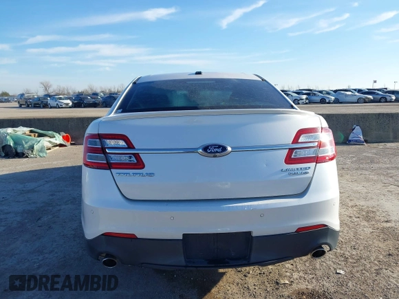 2015 Ford Taurus Limited с VIN 1FAHP2F85FG169704, выставлен на аукционе IAAI как лот 41152599 с пробегом 167 589 миль миль и . История ставок и продаж доступна на DreamBid. Изображение 16.