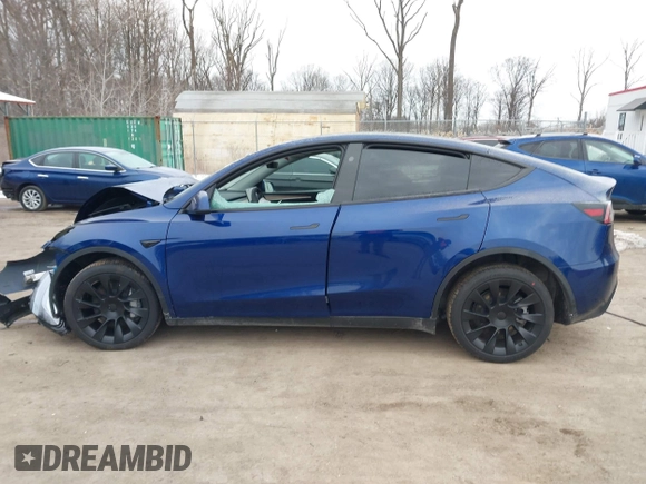 2025 Tesla Model Y Long Range with VIN 7SAYGDED9SF248370, listed as a IAAI auction lot 41336869 with 2,499 mi miles and . Bid and sale history available at DreamBid. Image 15.