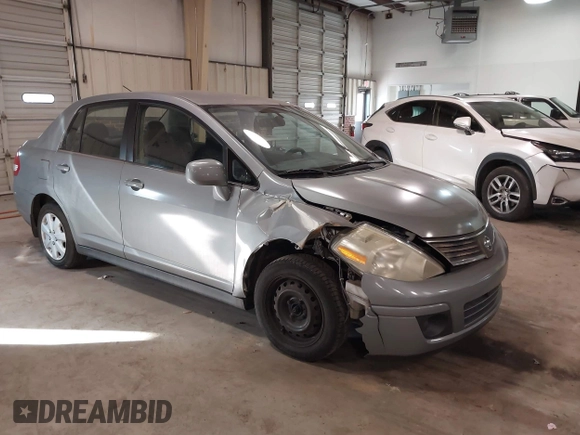 2008 Nissan Versa 1.8 S with VIN 3N1BC11E78L440086, listed as a IAAI auction lot 41362588 with 123,227 mi miles. Bid and sale history available at carsss.com. Image 1.