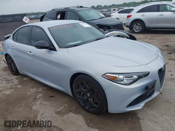 2021 Alfa Romeo Giulia z VIN ZARFAMAN6M7645490, wystawiony jako IAAI lot #42165037 z przebiegiem 57 701 mil mil oraz . Historia ofert i sprzedaży dostępna na DreamBid. Obrazek 1.