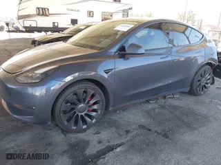 2021 Tesla Model Y Performance with VIN 5YJYGDEF4MF201989, listed as a IAAI auction lot 41658282 with 75,025 mi miles. Bid and sale history available at carsss.com. Image 18.