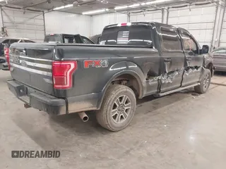 2015 Ford F-150 XLT w/HD Payload Pkg with VIN 1FTFW1EGXFFA39852, listed as a IAAI auction lot 41769971 with 163,929 mi miles. Bid and sale history available at carsss.com. Image 4.