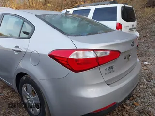 2015 Kia Forte LX with VIN KNAFX4A62F5386526, listed as a IAAI auction lot 41800783 with 124,553 mi miles. Bid and sale history available at carsss.com. Image 12.