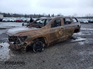 2020 GMC Acadia AT4 z VIN 1GKKNLLSXLZ160447, wystawiony jako Copart lot #82210224 z przebiegiem Nie podano mil oraz Nie do naprawy • Non repairable. Historia ofert i sprzedaży dostępna na DreamBid. Obrazek 1.