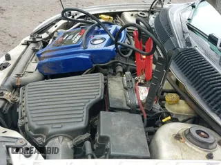 2000 Dodge Neon Highline z VIN 1B3ES46C5YD731845, wystawiony jako IAAI lot #42436755 z przebiegiem 177 211 mil mil oraz . Historia ofert i sprzedaży dostępna na DreamBid. Obrazek 12.