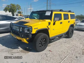 2003 Hummer H2 with VIN 5GRGN23U93H108017, listed as a IAAI auction lot 41793034 with 203,739 mi miles. Bid and sale history available at carsss.com. Image 2.