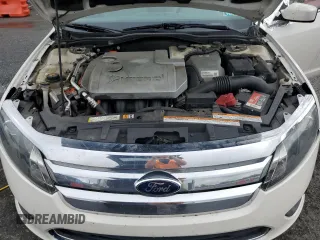 2010 Ford Fusion Hybrid with VIN 3FADP0L36AR203663, listed as a Copart auction lot 60310095 with 211,922 mi miles and Salvage title. Bid and sale history available at DreamBid. Image 11.