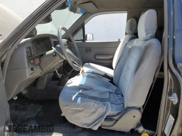 1990 Toyota Pickup DLX with VIN JT4RN93P3L5021924, listed as a Copart auction lot 64699075 with 287,298 mi miles and Clean title. Bid and sale history available at DreamBid. Image 7.