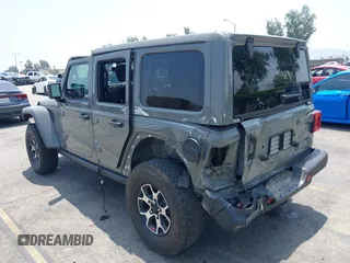 2020 Jeep Wrangler Unlimited Rubicon with VIN 1C4HJXFG3LW279636, listed as a IAAI auction lot 42430354 with 19,631 mi miles and . Bid and sale history available at DreamBid. Image 6.