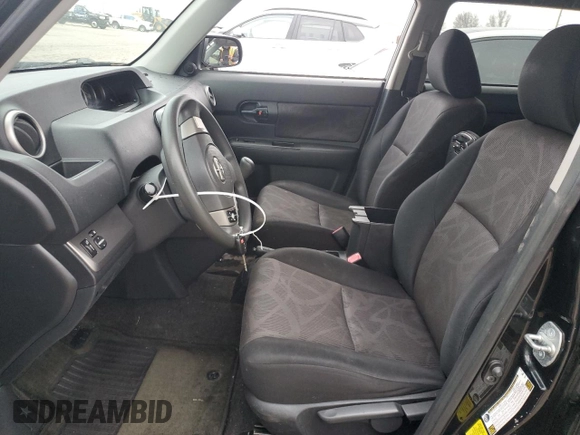 2014 Scion xB z VIN JTLZE4FE7EJ049074, wystawiony jako Copart lot #85734414 z przebiegiem 102 358 mil mil oraz Szkoda całkowita • Salvage title. Historia ofert i sprzedaży dostępna na DreamBid. Obrazek 7.