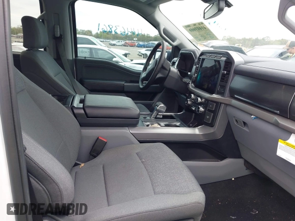 2024 Ford F-150 Lightning XLT with VIN 1FTVW3LKXRWG01185, listed as a IAAI auction lot 41679606 with 4,961 mi miles and . Bid and sale history available at DreamBid. Image 5.