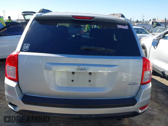 2011 Jeep Compass with VIN 1J4NT1FA4BD139153, listed as a IAAI auction lot 41665481 with 164,412 mi miles. Bid and sale history available at carsss.com. Image 17.