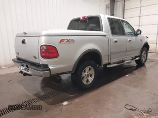 2003 Ford F-150 XLT with VIN 1FTRW08L83KA45989, listed as a IAAI auction lot 41048095 with 226,328 mi miles. Bid and sale history available at carsss.com. Image 4.