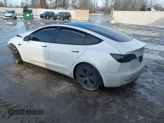 2021 Tesla Model 3 Long Range with VIN 5YJ3E1EB6MF094309, listed as a IAAI auction lot 41651475 with Not Provided miles. Bid and sale history available at carsss.com. Image 3.