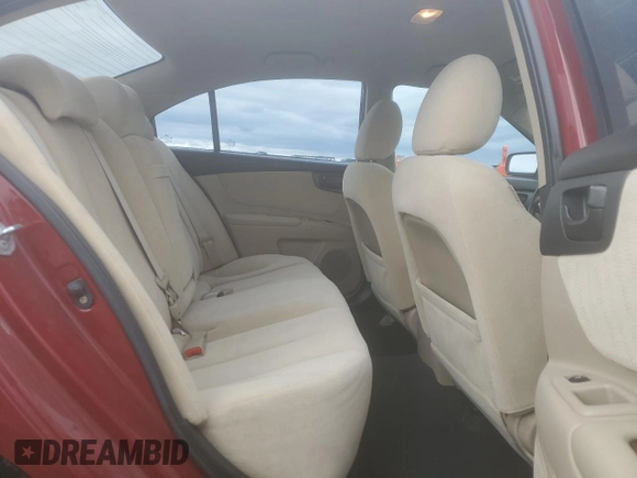 2009 Kia Optima LX z VIN KNAGE228395313765, wystawiony jako Copart lot #59707675 z przebiegiem 170 773 mil mil oraz Szkoda całkowita • Salvage title. Historia ofert i sprzedaży dostępna na DreamBid. Obrazek 10.