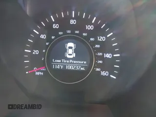 2015 Kia Optima LX with VIN 5XXGM4A71FG402624, listed as a IAAI auction lot 40493003 with 100,237 mi miles. Bid and sale history available at carsss.com. Image 7.