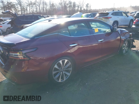 2020 Nissan Maxima Platinum with VIN 1N4AA6FV1LC377694, listed as a IAAI auction lot 40997776 with 14,321 mi miles and . Bid and sale history available at DreamBid. Image 4.