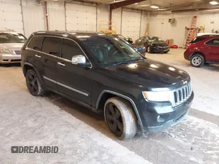 2011 Jeep Grand Cherokee Limited z VIN 1J4RR5GTXBC586647, wystawiony jako IAAI lot #42332615 z przebiegiem 151 377 mil mil oraz . Historia ofert i sprzedaży dostępna na DreamBid. Obrazek 1.