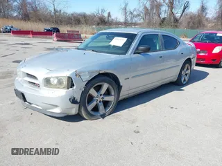 2009 Dodge Charger R/T with VIN 2B3LA53T89H610073, listed as a IAAI auction lot 41812611 with 135,364 mi miles. Bid and sale history available at carsss.com. Image 2.