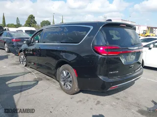 2023 Chrysler Pacifica Hybrid Touring L with VIN 2C4RC1L78PR543402, listed as a IAAI auction lot 41536710 with 35,867 mi miles. Bid and sale history available at carsss.com. Image 3.