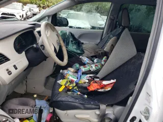 2014 Toyota Sienna L with VIN 5TDZK3DC8ES520037, listed as a Copart auction lot 54092715 with Not provided miles and Salvage title. Bid and sale history available at DreamBid. Image 7.
