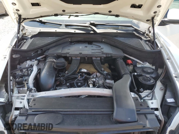 2012 BMW X5 35d with VIN 5UXZW0C57CL672443, listed as a Copart auction lot 55689215 with 247,014 mi miles and Clean title. Bid and sale history available at DreamBid. Image 12.