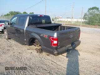 2018 Ford F-150 XL with VIN 1FTEW1EP9JFB24945, listed as a IAAI auction lot 42380592 with 132,895 mi miles and . Bid and sale history available at DreamBid. Image 3.