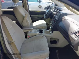 2012 Dodge Grand Caravan SXT with VIN 2C4RDGCGXCR277505, listed as a IAAI auction lot 42194492 with 206,565 mi miles and . Bid and sale history available at DreamBid. Image 5.