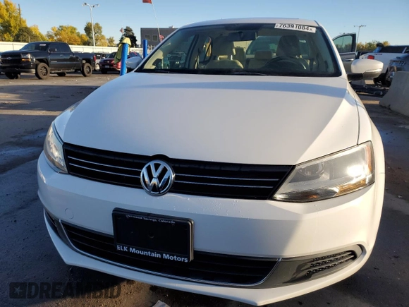 2014 Volkswagen Jetta TDI w/Premium with VIN 3VW3L7AJ4EM390185, listed as a Copart auction lot 76391084 with 49,897 mi miles and Salvage title. Bid and sale history available at DreamBid. Image 5.