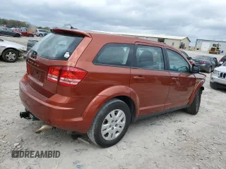 2014 Dodge Journey American Value with VIN 3C4PDCAB8ET133197, listed as a Copart auction lot 51381145 with 191,269 mi miles and Salvage title. Bid and sale history available at DreamBid. Image 3.