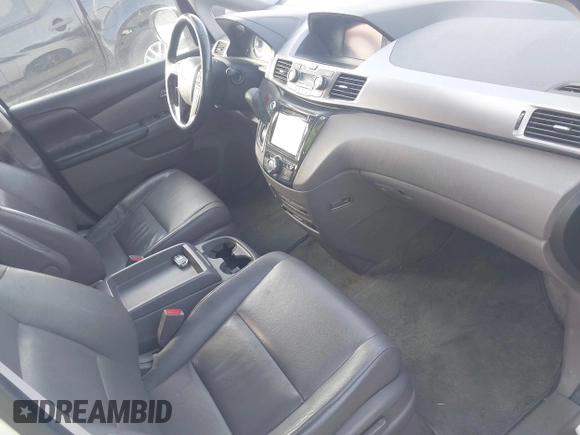 2014 Honda Odyssey Touring with VIN 5FNRL5H97EB127836, listed as a IAAI auction lot 41497413 with 174,914 mi miles and . Bid and sale history available at DreamBid. Image 5.