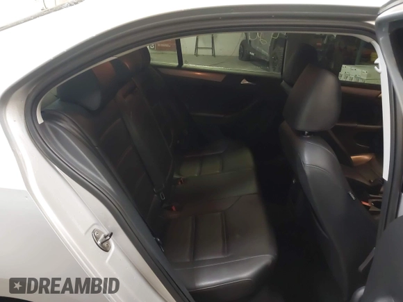 2014 Volkswagen Jetta TDI w/Premium with VIN 3VW3L7AJ6EM379401, listed as a IAAI auction lot 42086326 with 89,870 mi miles and . Bid and sale history available at DreamBid. Image 8.