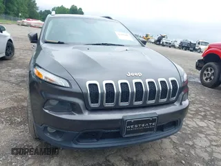 2016 Jeep Cherokee Altitude with VIN 1C4PJMCB6GW117878, listed as a IAAI auction lot 42418402 with 139,665 mi miles and . Bid and sale history available at DreamBid. Image 12.