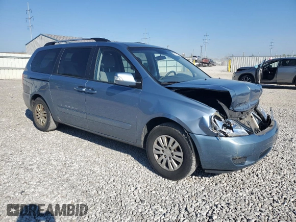 2012 Kia Sedona LX with VIN KNDMG4C70C6447748, listed as a Copart auction lot 71377294 with 146,057 mi miles and Salvage Title. Bid and sale history available at carsss.com. Image 4.