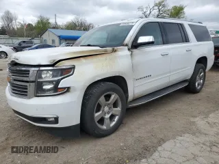 2017 Chevrolet Suburban Premier z VIN 1GNSKJKC2HR115049, wystawiony jako Copart lot #50656275 z przebiegiem Nie podano mil oraz Szkoda całkowita • Salvage title. Historia ofert i sprzedaży dostępna na DreamBid. Obrazek 1.