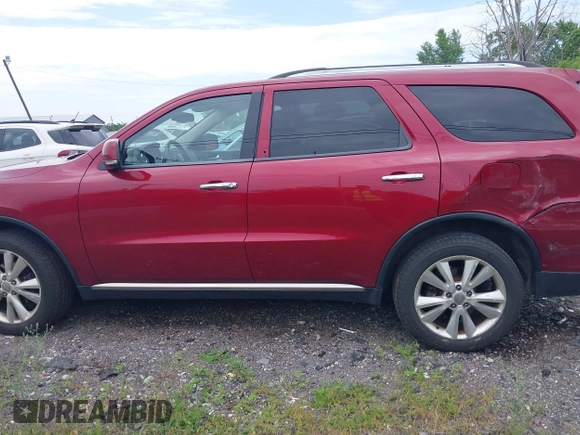 2013 Dodge Durango Crew with VIN 1C4RDJDGXDC614275, listed as a IAAI auction lot 42595022 with 171,260 mi miles and . Bid and sale history available at DreamBid. Image 14.