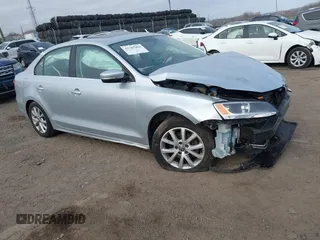 2014 Volkswagen Jetta Sedan SE w/Connectivity/Sunroof PZEV with VIN 3VWD17AJ5EM362888, listed as a IAAI auction lot 41787904 with 143,332 mi miles. Bid and sale history available at carsss.com. Image 1.