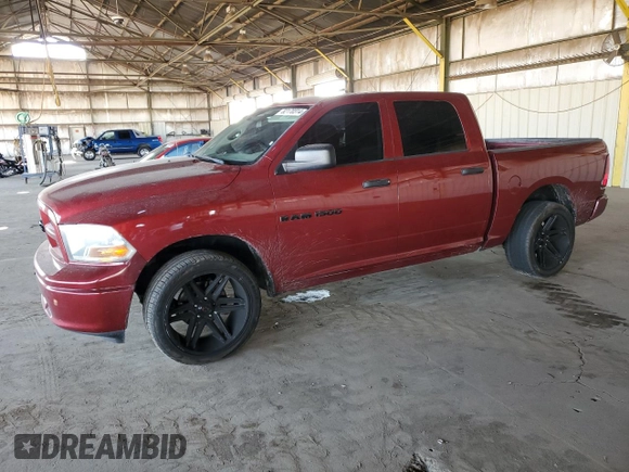 2012 Ram 1500 Tradesman with VIN 1C6RD6KP2CS296003, listed as a Copart auction lot 82170314 with 136,216 mi miles and Salvage title. Bid and sale history available at DreamBid. Image 1.