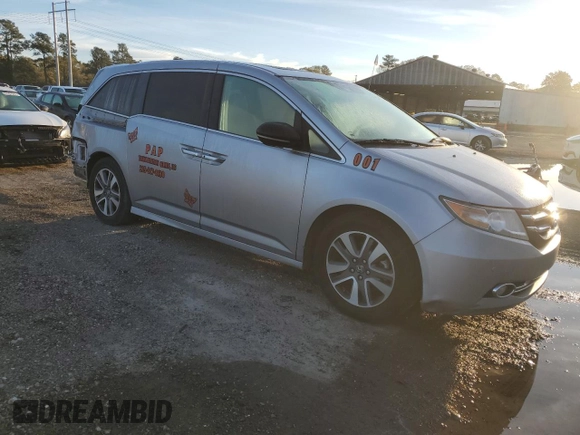 2016 Honda Odyssey Touring Elite with VIN 5FNRL5H92GB010748, listed as a Copart auction lot 48997425 with 145,251 mi miles and Salvage Title. Bid and sale history available at DreamBid. Image 4.