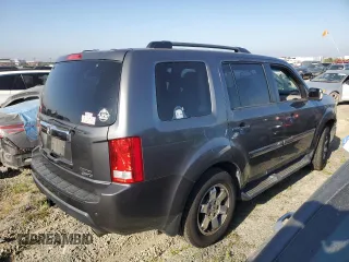 2011 Honda Pilot Touring z VIN 5FNYF4H94BB046303, wystawiony jako Copart lot #58017515 z przebiegiem 118 384 mil mil oraz Szkoda całkowita • Salvage title. Historia ofert i sprzedaży dostępna na DreamBid. Obrazek 3.