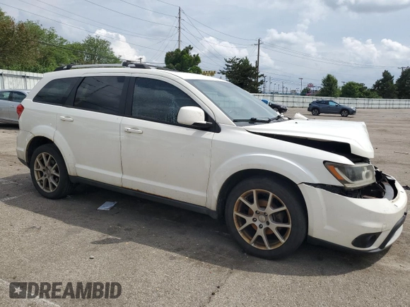 2012 Dodge Journey SXT with VIN 3C4PDCCG4CT243492, listed as a Copart auction lot 59908485 with 319,175 mi miles and Salvage title. Bid and sale history available at DreamBid. Image 4.