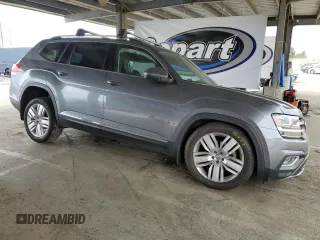 2018 Volkswagen Atlas SEL Premium with VIN 1V2NR2CA7JC576047, listed as a Copart auction lot 55309005 with 137,472 mi miles and Salvage title. Bid and sale history available at DreamBid. Image 4.