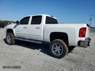 2012 Chevrolet Silverado 1500 LT with VIN 3GCPKSE70CG127566, listed as a Copart auction lot 76390764 with 151,661 mi miles and Salvage Title. Bid and sale history available at carsss.com. Image 2.