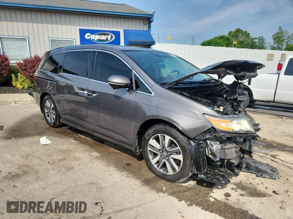 2015 Honda Odyssey Touring Elite with VIN 5FNRL5H98FB125532, listed as a Copart auction lot 60656485 with 184,421 mi miles and Non repairable. Bid and sale history available at DreamBid. Image 4.