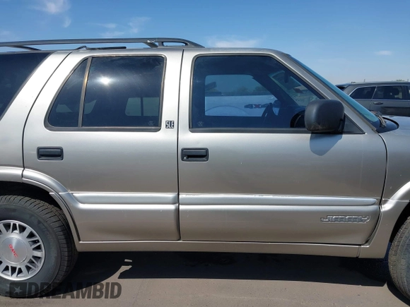 1999 GMC Jimmy SLE with VIN 1GKDT13W5X2539067, listed as a IAAI auction lot 41979222 with 1 mi miles. Bid and sale history available at carsss.com. Image 13.