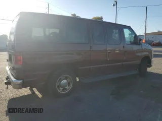 2010 Ford Econoline Passenger XL with VIN 1FMNE1BW6ADA87472, listed as a Copart auction lot 74989314 with 215,315 mi miles and Salvage Title. Bid and sale history available at DreamBid. Image 3.